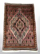 A Tabriz rug, 121 cm x 80 cm.