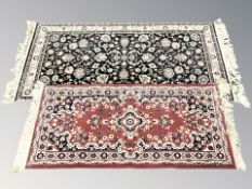 Two machine made Persian designed rugs, largest 177 cm x 84 cm.