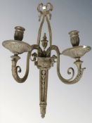 A brass twin branch wall sconce, length 50 cm.