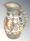 A Charlotte Rhead for Crown Ducal jug, height 22 cm.