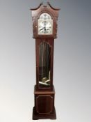 A reproduction Tempus Fugit granddaughter clock, with pendulum and three weights, height 158 cm.