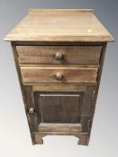 A mahogany pot cupboard,