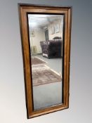 A 19th century walnut and ebonised mirror,