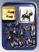 A group of painted die cast soldiers, guardsmen, cavalry figures, two W.B.