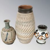 Three various studio pottery vases, tallest 30 cm.