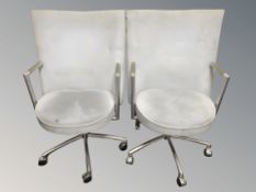 A pair of Danish Erik Jorgensen designed 'Partner' chrome-framed executive swivel armchairs,