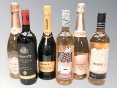 Six various bottles of alcohol including Prosecco, Chianti, etc.