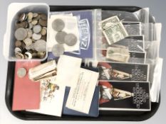 Assorted crowns, uncirculated one pound coins, dollar bills, decimal and pre-decimal pieces.