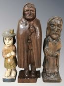 Three continental carved wooden figures, tallest 39 cm.