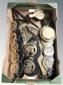 A collection of horse brasses, bellows, miniature bed warming pan, etc.