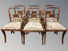 A set of six Regency style mahogany dining chairs,