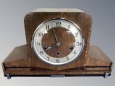 An Art Deco inlaid walnut eight day mantel clock, height 23 cm.