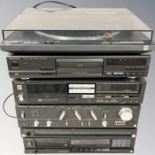 A group of Technics hi-fi separates including turntable, CD player, amplifier, cassette deck, etc.