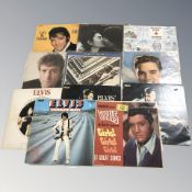 A small group of vinyl LP records including John Lennon, The Beatles,