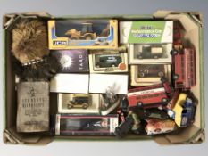 A group of boxed and unboxed die case vehicles including Lledo, vintage student microscope, etc.