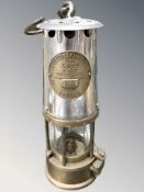 An Eccles Protector Type G6RS miner's safety lamp.