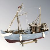 A wooden scale model of a trawler, length 45 cm.
