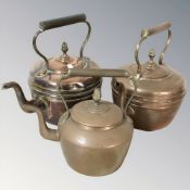 Three Victorian copper kettles.