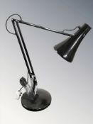 An enameled metal angle poised lamp