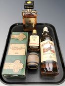 A bottle of Disaronno Originale Amaretto, 50 cl, Famous Grouse Finest Scotch whisky, 1l,