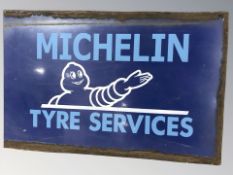 A double sided Michelin enameled sign, length 41 cm.