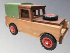 A handmade wooden miniature model of a Land Rover, length 50 cm.