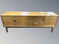 A G Plan teak low sideboard, fitted cupboards and drawers, 206 cm L x 76 cm D x 80 cm H.