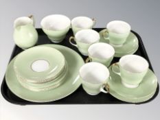 Twenty one pieces of Wedgwood tea china on pale green ground.