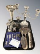 An EPNS three sconce candelabrum, a group of bud vases,