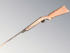 A mid 20th century break-action air rifle.