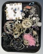 A group of modern costume jewellery including necklaces, earrings, pendants, etc.
