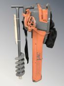 A Flymo garden vacuum and an auger.