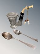Two silver spoons and a German pewter pipe. CONDITION REPORT: Spoons: 35.4g.