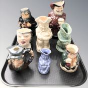 Eleven various toby jugs including Royal Doulton.