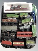 A group of vintage tin plate rolling stock,