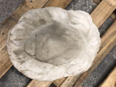 A concrete lion mask garden wall plaque,