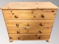 A modern pine four drawer chest, 87 cm W x 47 cm D x 76 cm H.