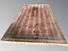 A machine-made carpet of Turkoman design,