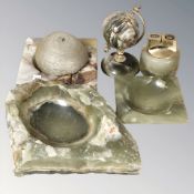 A group of onyx items including table lighter, miniature globe, ash trays, etc.