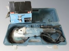 A Makita GA9020 disk saw, in box, and a further boxed Makita trimmer.