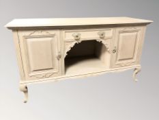 A limed oak sideboard, 183 cm W x 67 cm D x 101 cm H.
