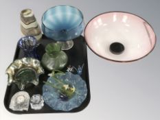 A group of coloured glass wares including bowls and vases, together with a crystal mantel timepiece,