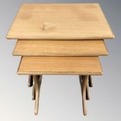 A teak G Plan nest of three tables,