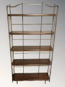 A modern hardwood and metal framed open bookshelf, 95 cm W x 25 cm D x 184 cm H.