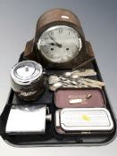 An Art Deco walnut mantel clock, together with a tea barrel, a stainless steel hip flask,