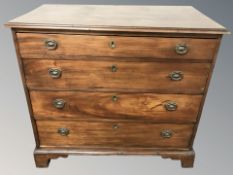 A George III mahogany four drawer chest,