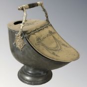 A Victorian brass coal helmet, length 48 cm.