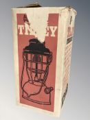 A Tilley lamp in box.