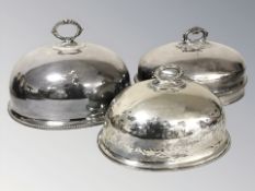 Three EPNS food covers.