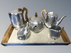 A five piece Picquot Ware tea and coffee service, on twin handled tray.